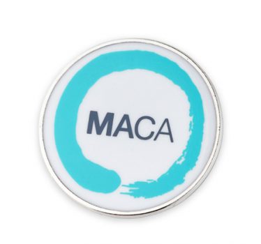 Round enamel badge printed with MACA logo